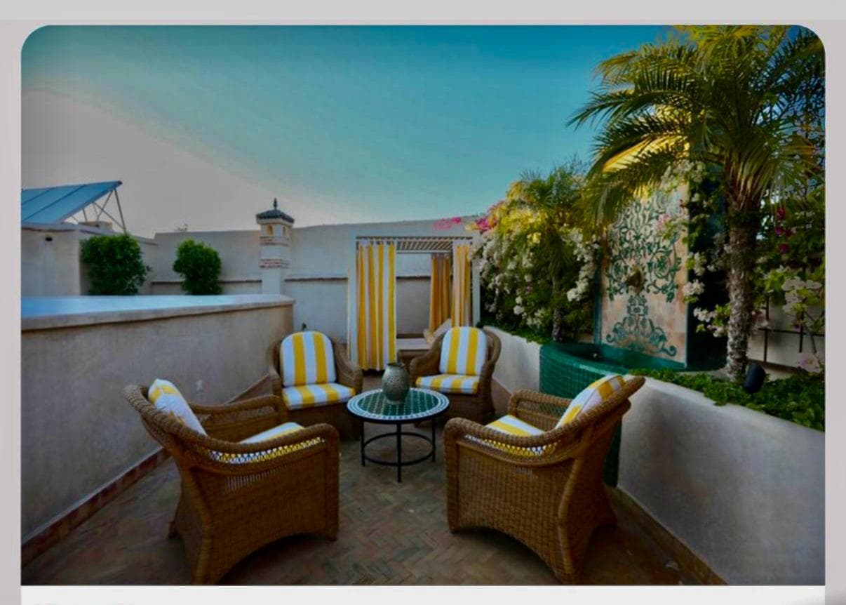 Rooftop lounge with striped cushions