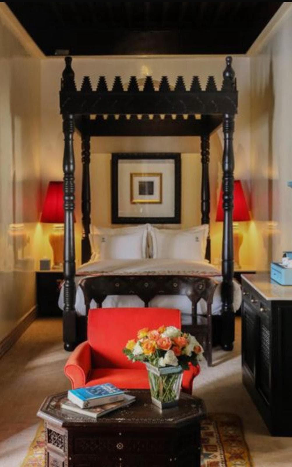 Suite with carved four-poster bed